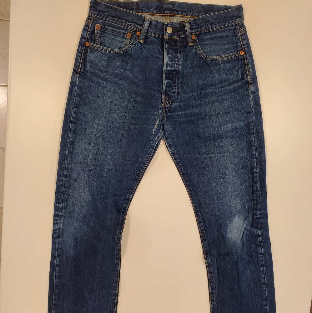 Levis 501's in a dark wash. 32W